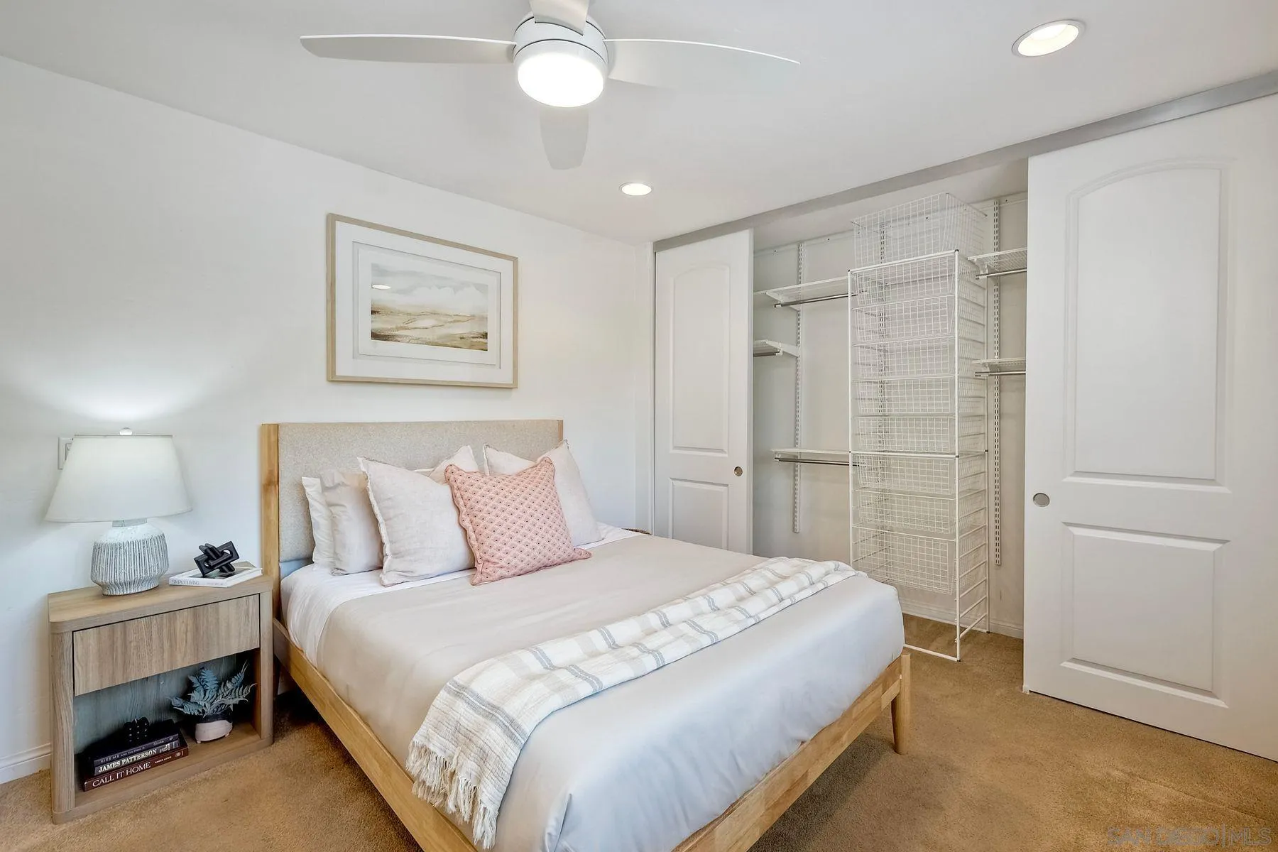 8850 Ellsworth Circle Santee, CA 92071 - Photo 17 of 29 a bedroom with a bed and a painting on the wall