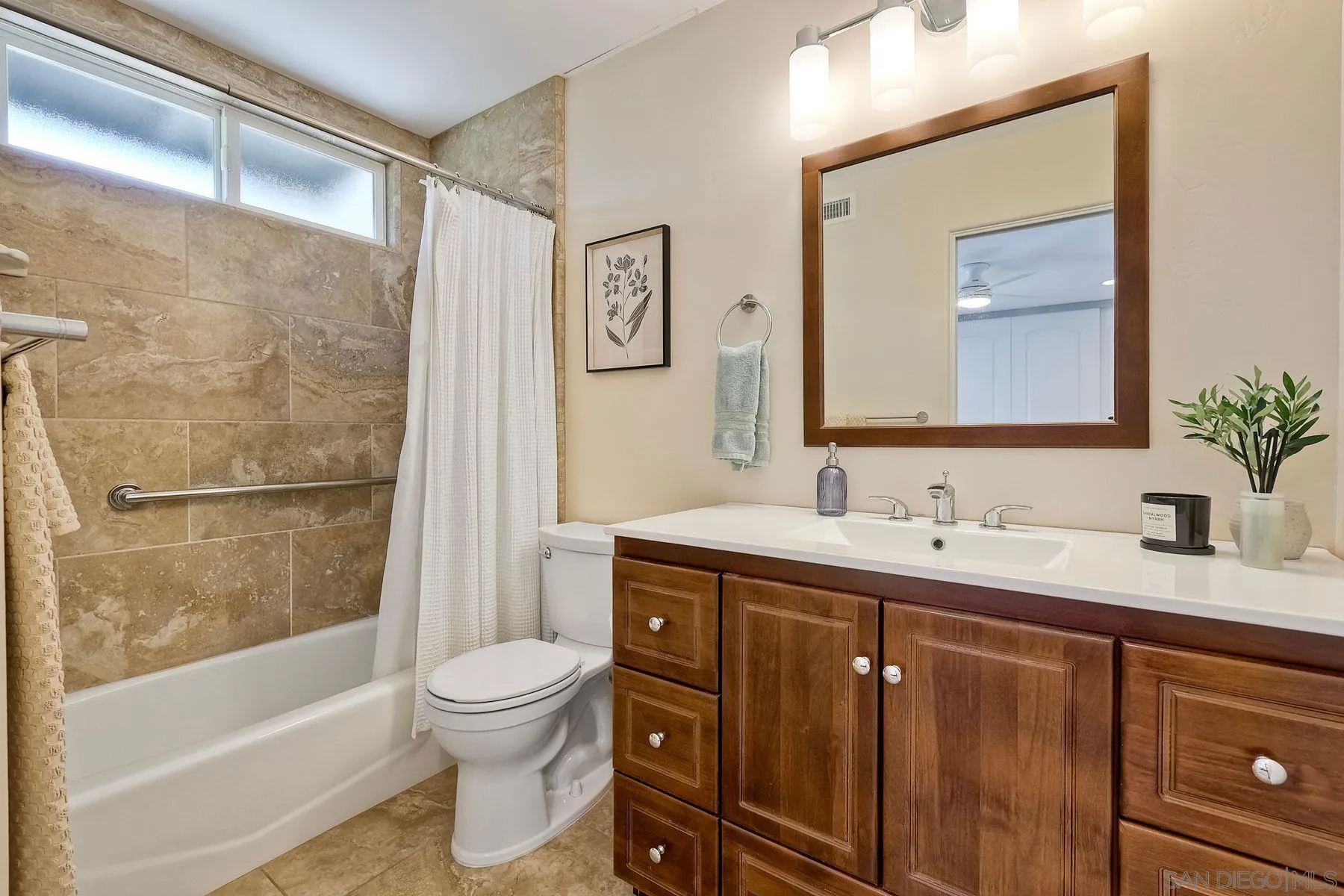 8850 Ellsworth Circle Santee, CA 92071 - Photo 19 of 29 a bathroom with a granite countertop sink toilet and shower