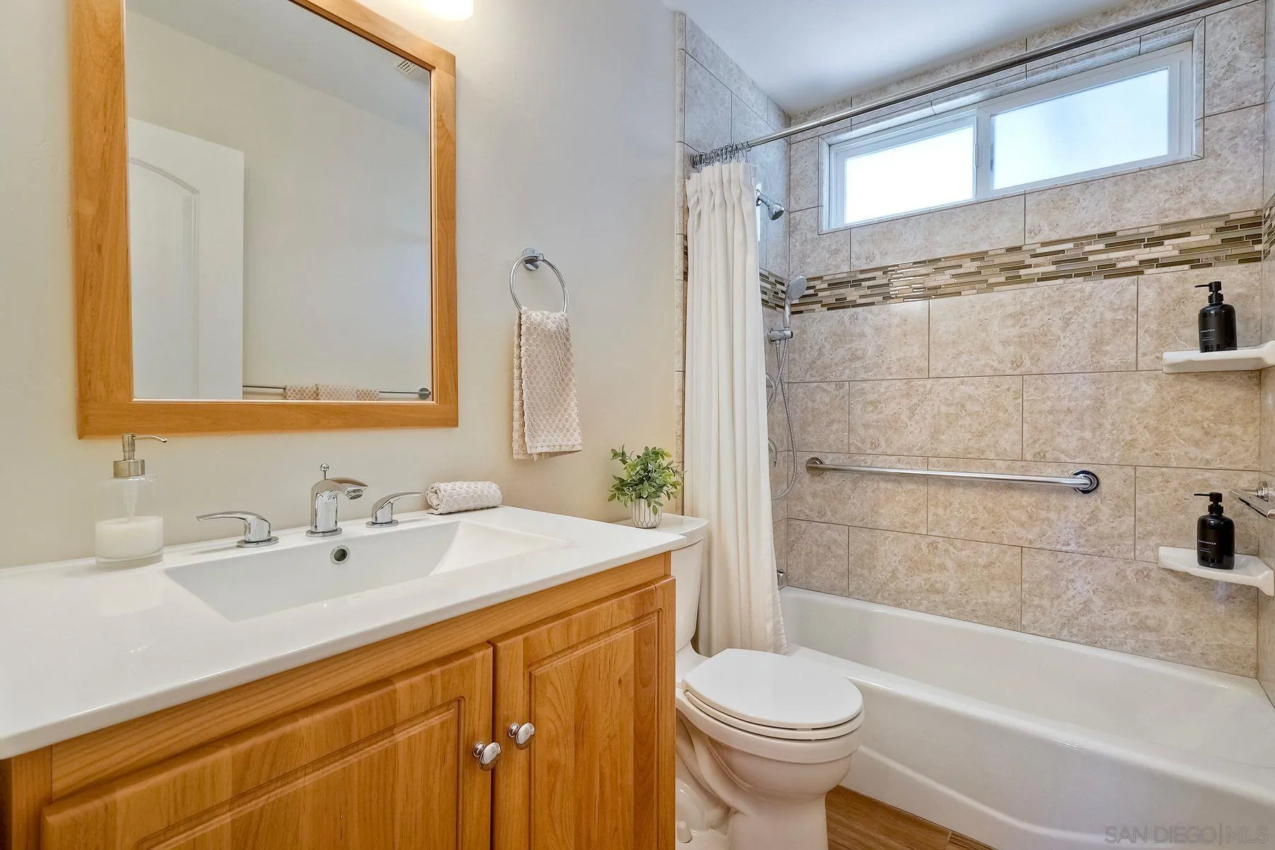 8850 Ellsworth Circle Santee, CA 92071 - Photo 24 of 29 a bathroom with a sink a toilet and shower