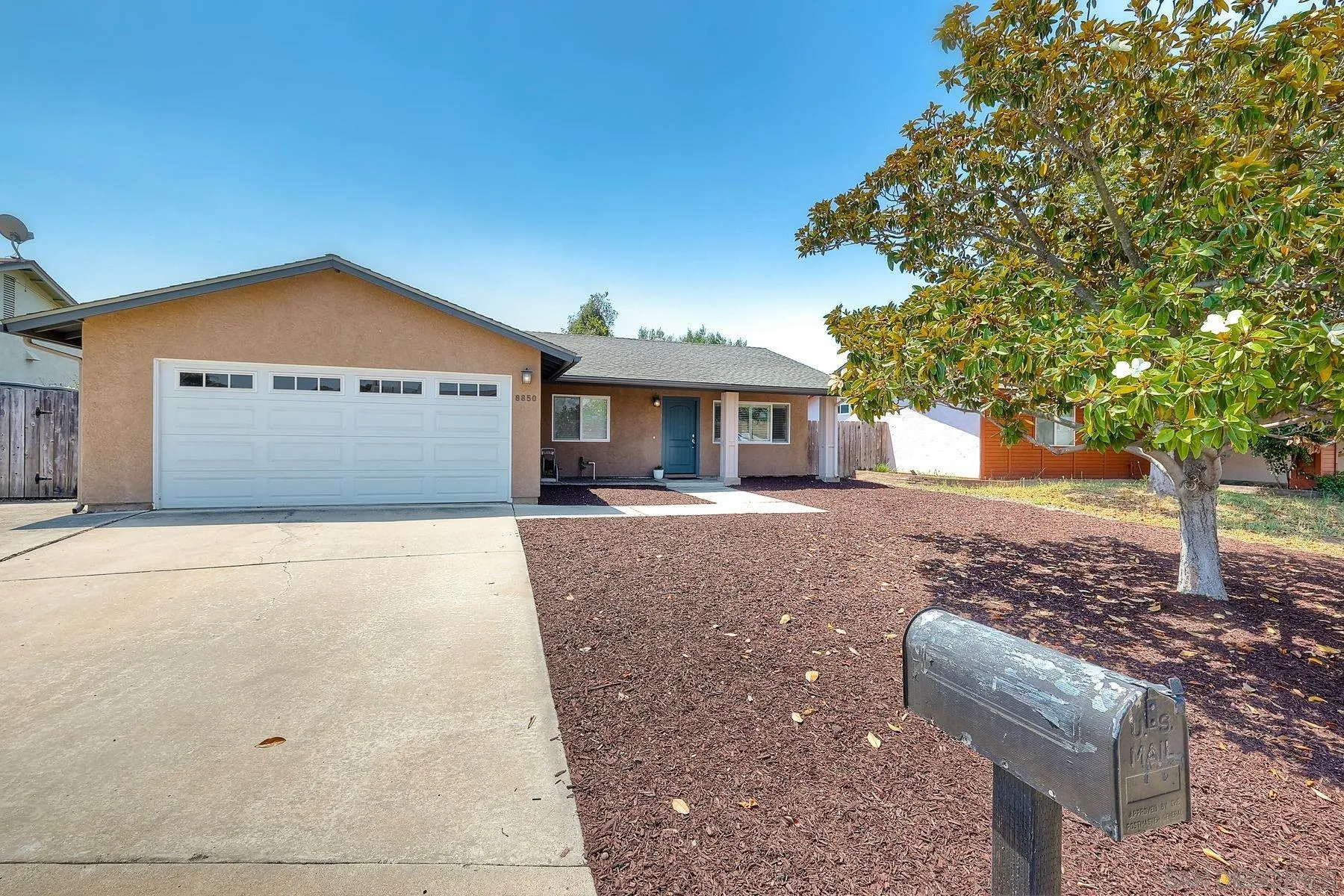 8850 Ellsworth Circle Santee, CA 92071 - Photo 3 of 29 a front view of a house with a yard
