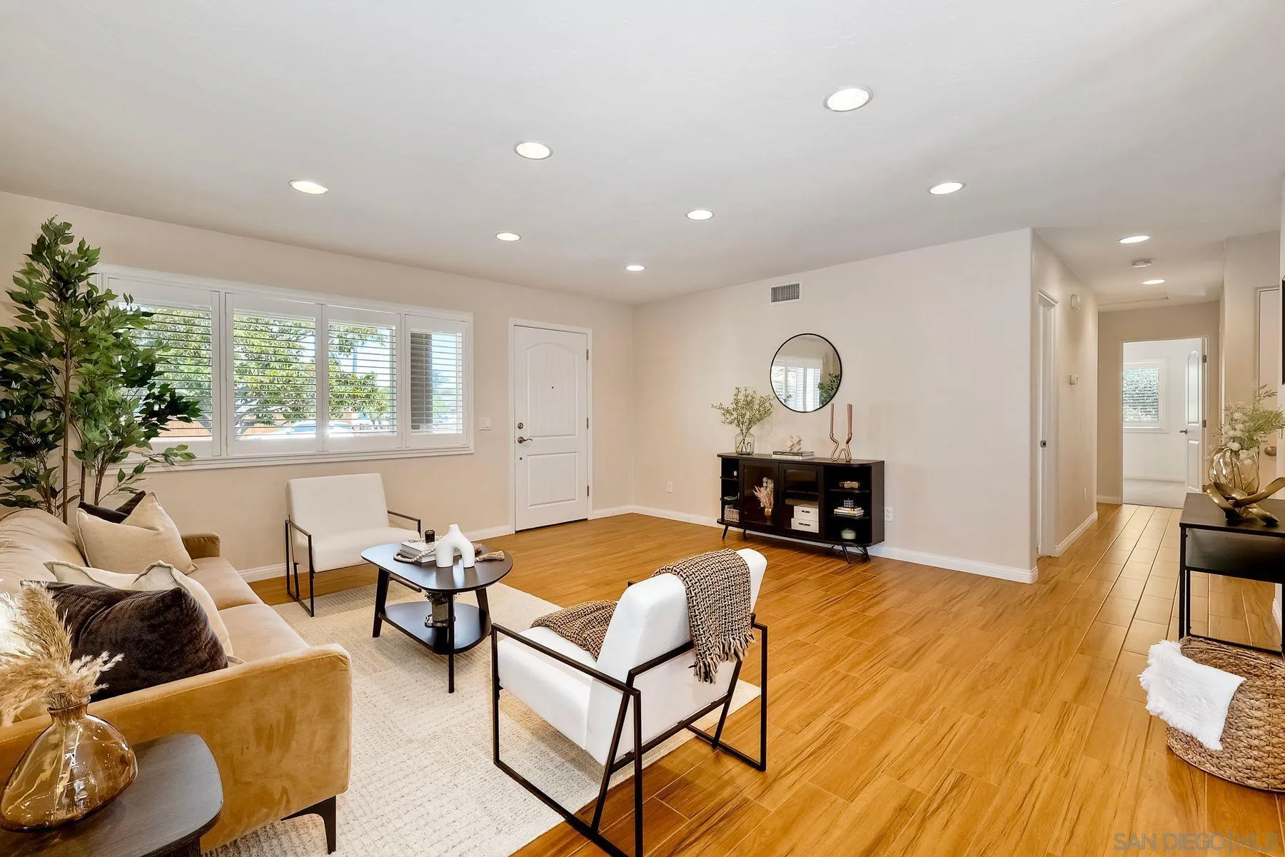 8850 Ellsworth Circle Santee, CA 92071 - Photo 7 of 29 a living room with furniture and a wooden floor