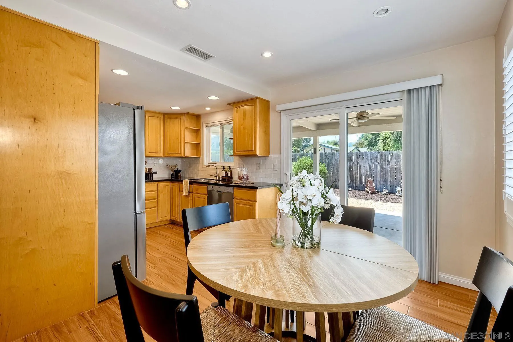 8850 Ellsworth Circle Santee, CA 92071 - Photo 9 of 29 a dining room with furniture and a large window