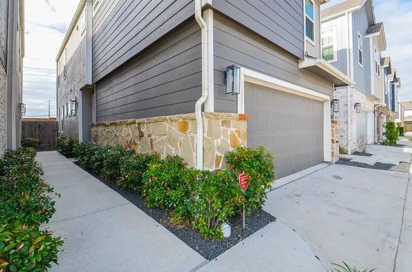 a view of a back yard of the house