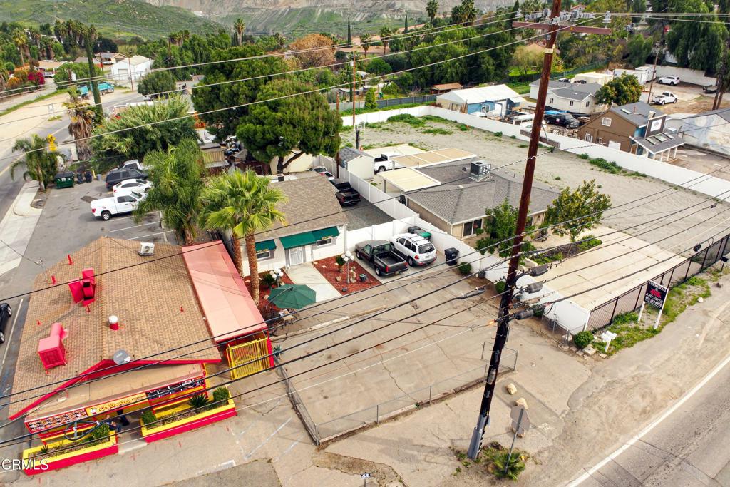 19586 Temescal Canyon Road Corona, CA 92881 - Photo 3 of 10 an aerial view of a houses with a street