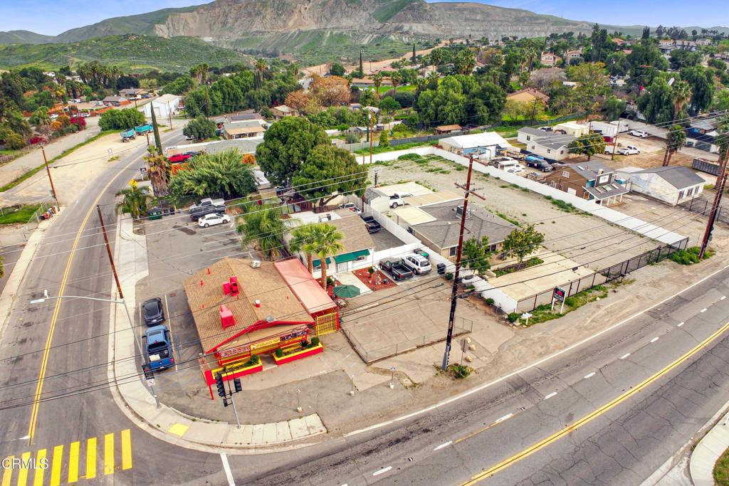 19586 Temescal Canyon Road Corona, CA 92881 - Photo 9 of 10 an aerial view of a swimming pool with a mountain view