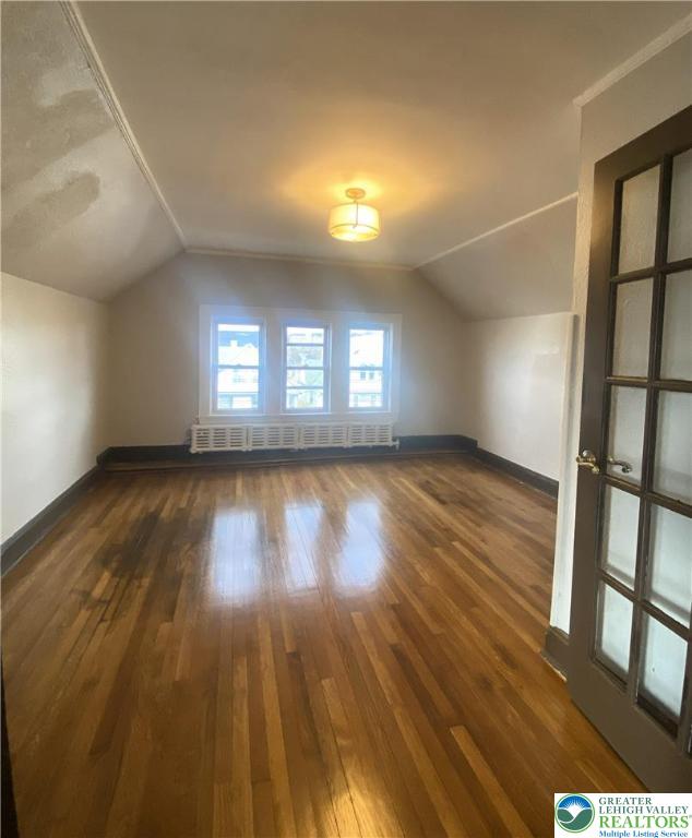 436 Wheeler Avenue, Unit 3 Scranton, PA 18510 - Photo 5 of 8 wooden floor in an empty room with a window