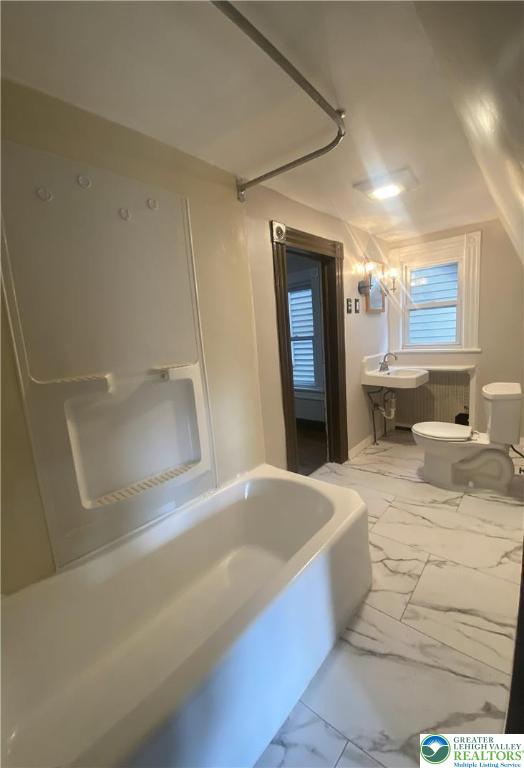 436 Wheeler Avenue, Unit 3 Scranton, PA 18510 - Photo 8 of 8 a bathroom with a bathtub and shower