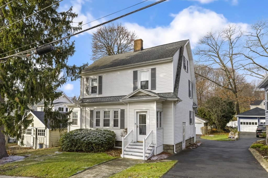 78 Ashcroft Road Medford, MA 02155 - Photo 1 of 34 a view of a white house next to a yard with big trees