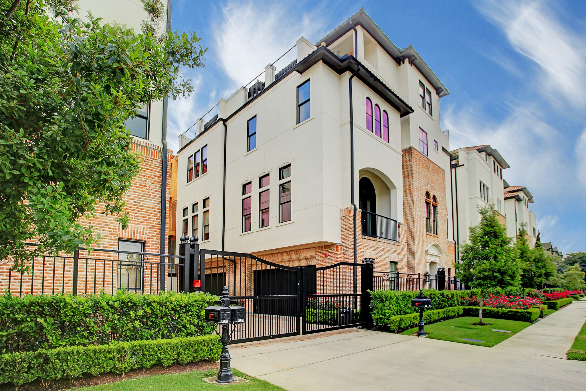 a front view of a building with garden