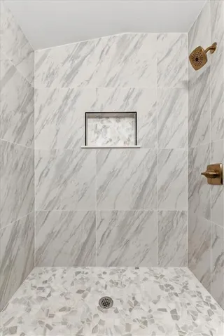 a view of a wall with a shower