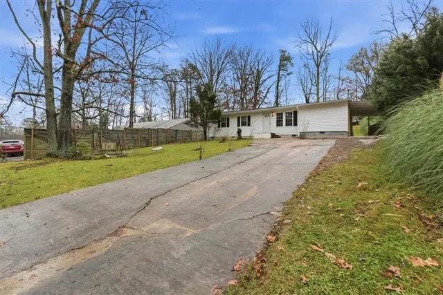 a house view with a backyard space