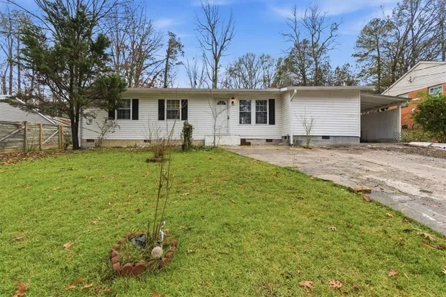 front view of a house with a yard