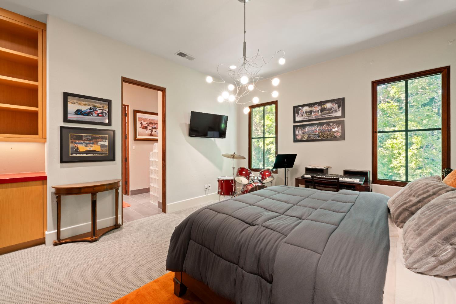 9345 King Road Loomis, CA 95650 - Photo 49 of 99 a bedroom with a bed and a flat screen tv