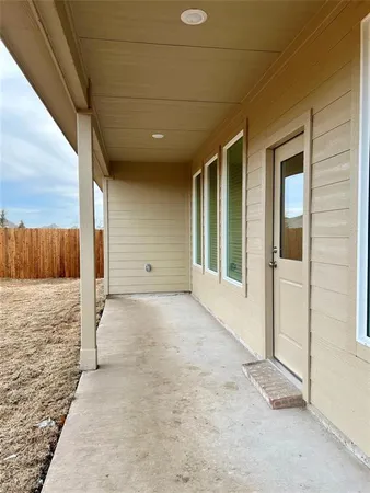 a bathroom with a sink toilet a mirror and bathtub