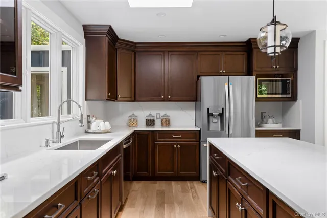 a dining room with furniture window wooden floor