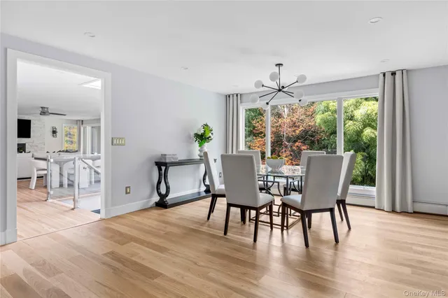 a kitchen with stainless steel appliances a refrigerator and a stove top oven