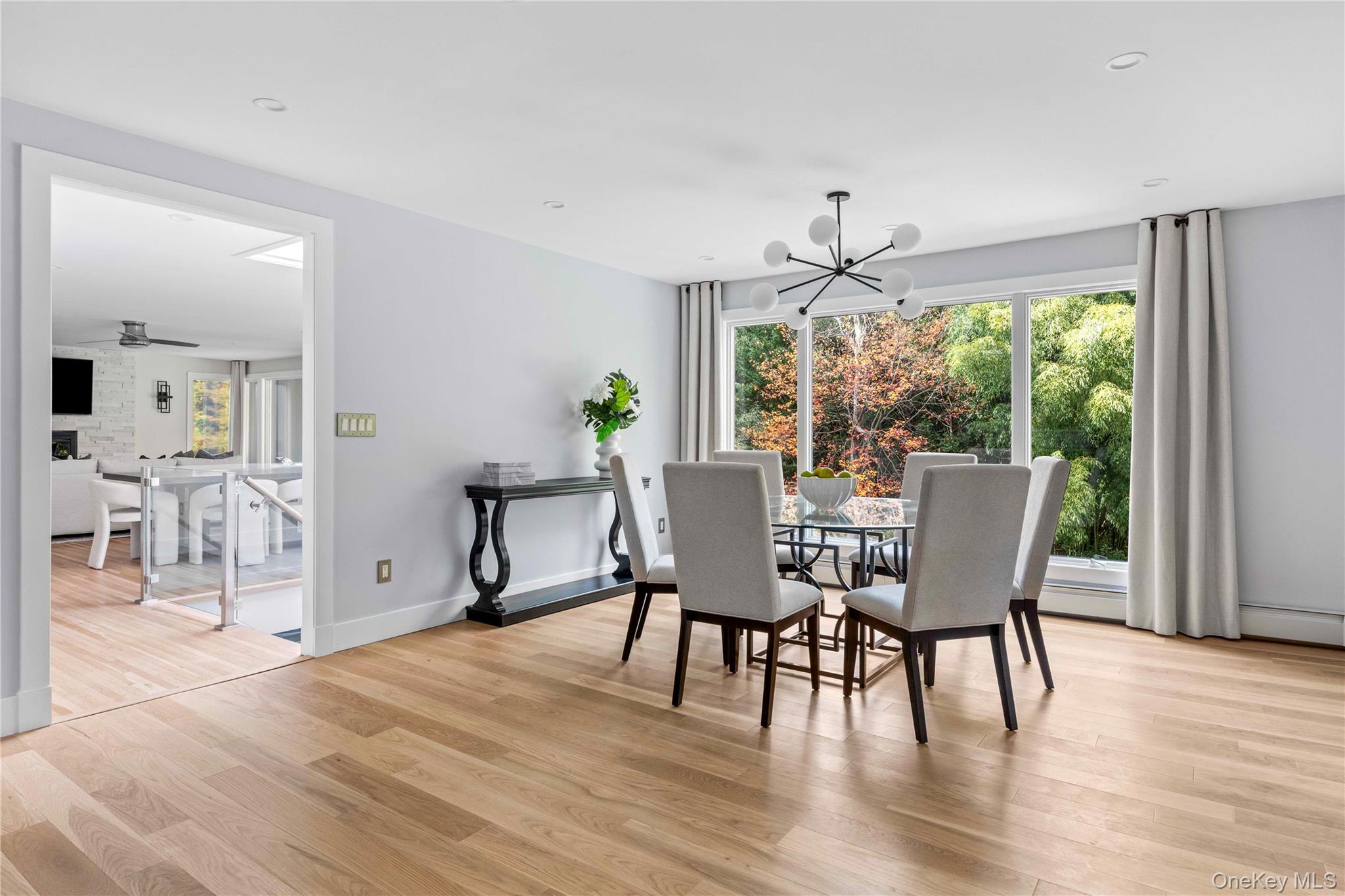 25 Wood Road Sands Point, NY 11050 - Photo 15 of 33 a dining room with furniture window wooden floor