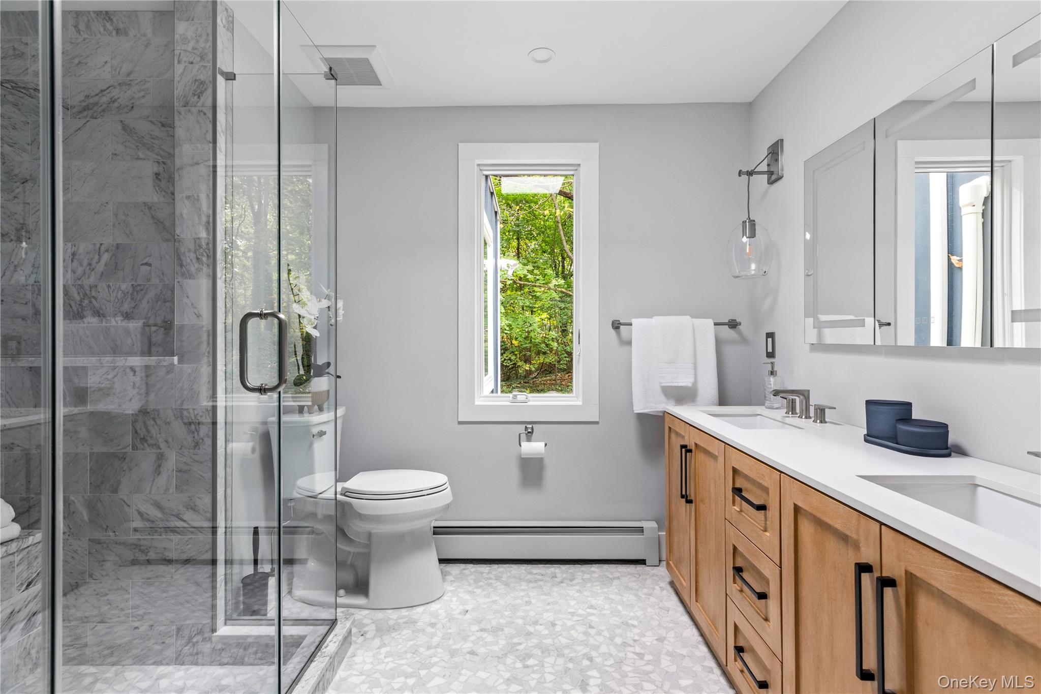 25 Wood Road Sands Point, NY 11050 - Photo 24 of 33 a bathroom with a sink toilet and shower