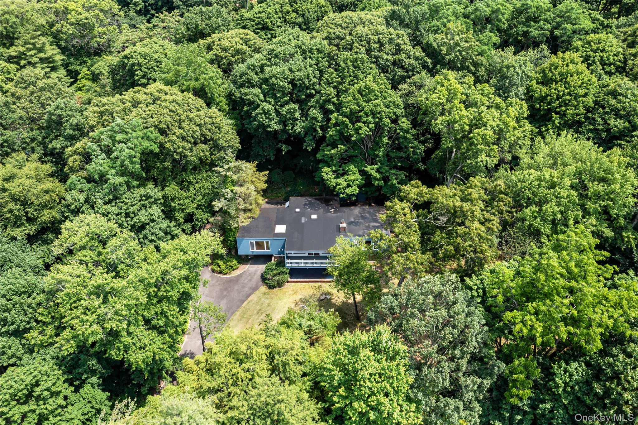 25 Wood Road Sands Point, NY 11050 - Photo 33 of 33 an aerial view of a house with a yard