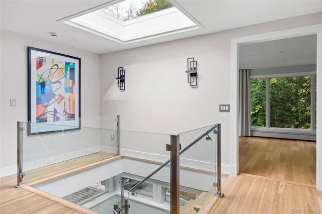 a living room with lots of furniture and a flat screen tv