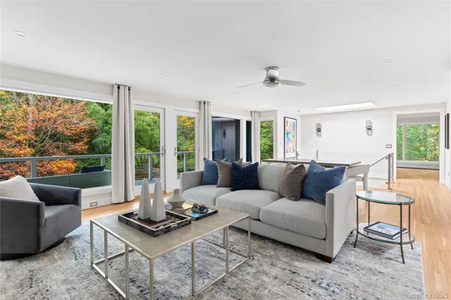 a living room with furniture and a table