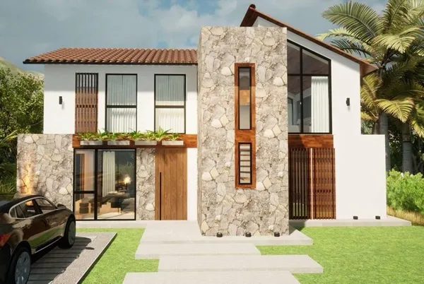 front view of a house with a yard