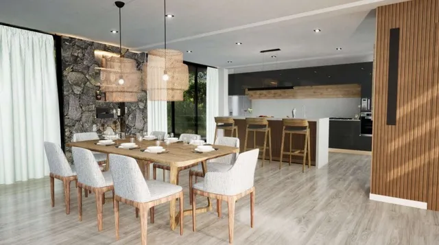 a kitchen with stainless steel appliances granite countertop a refrigerator a sink a stove and white cabinets with wooden floor