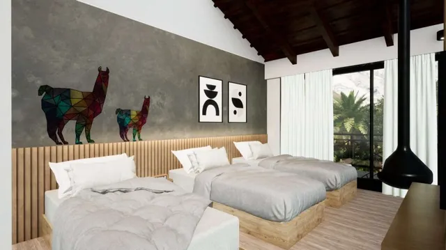 a bedroom with a large bed and a large window