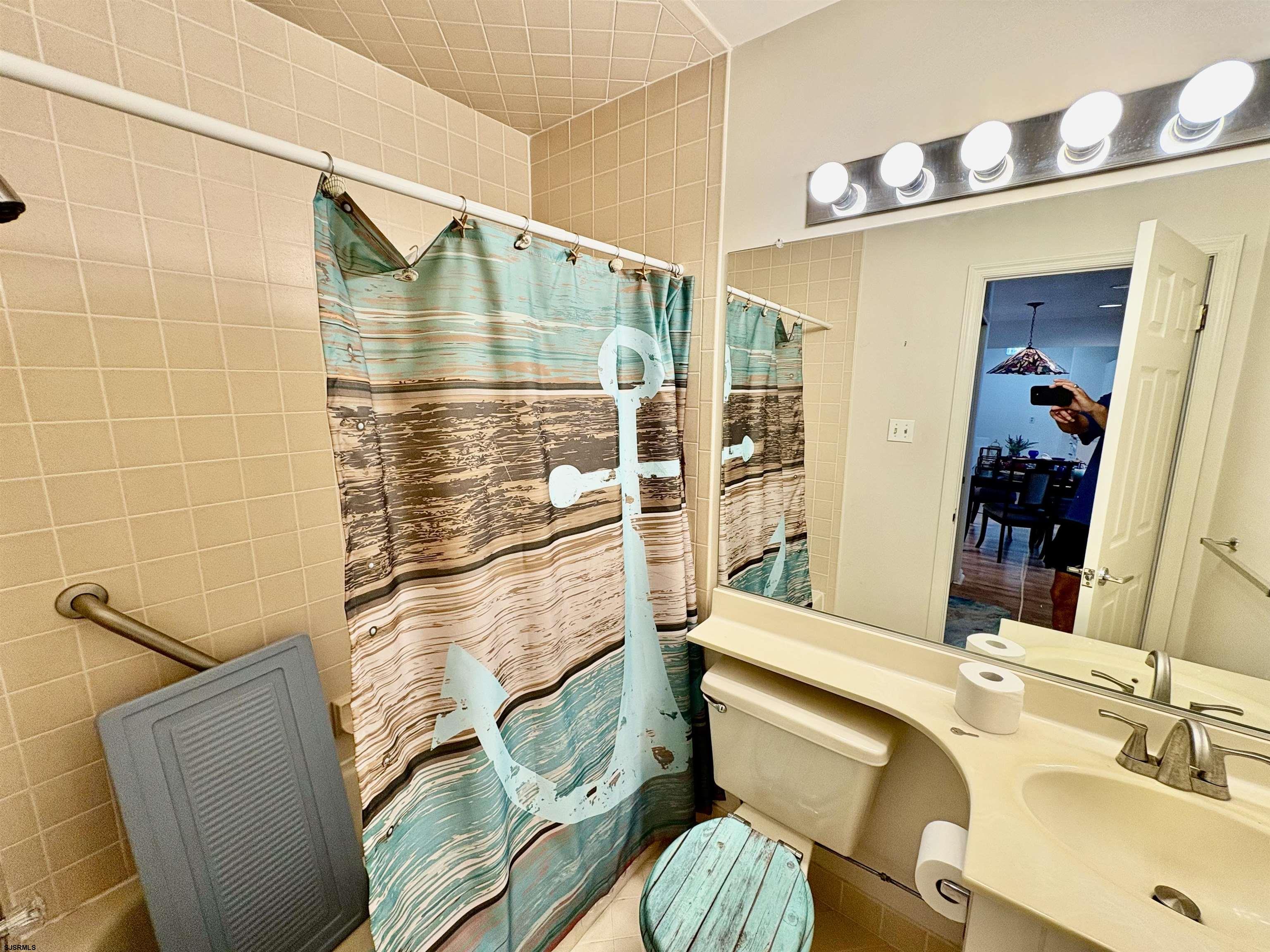 550 Central Avenue, Unit G16 CONSTITUTION CT Linwood, NJ 08221 - Photo 10 of 13 a bathroom with a sink toilet and shower