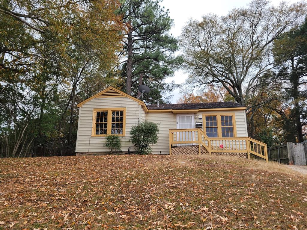 View of front of home with a deck