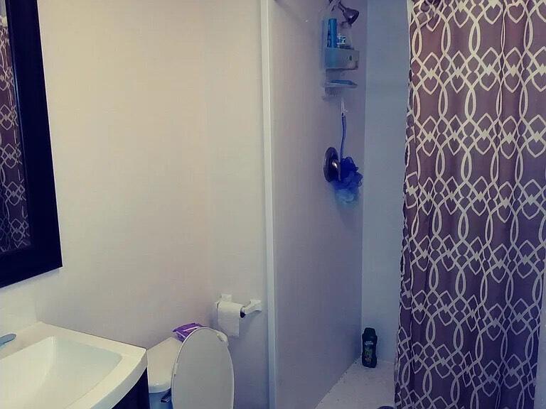 2800 Fiore Way, Unit 108 Delray Beach, FL 33445 - Photo 6 of 9 a bathroom with a sink and a toilet