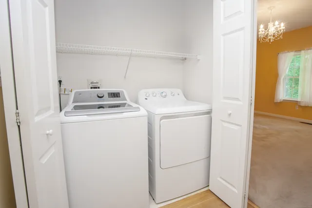 an empty room with a fireplace