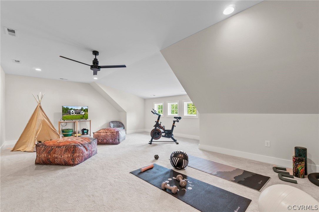 9440 Wickham Crossing Way Ashland, VA 23005 - Photo 23 of 26 a living room with furniture and a gym equipment