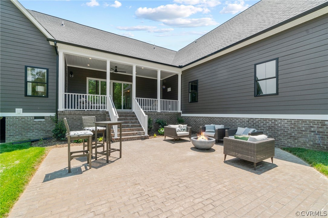 9440 Wickham Crossing Way Ashland, VA 23005 - Photo 26 of 26 a backyard of a house with outdoor seating