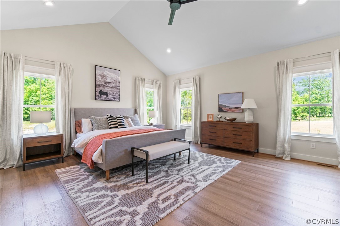 9440 Wickham Crossing Way Ashland, VA 23005 - Photo 5 of 26 a spacious bedroom with a bed wooden floor and window