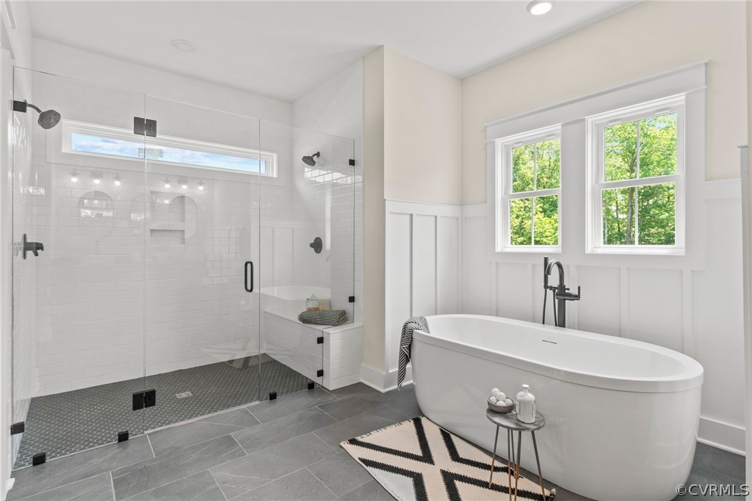 9440 Wickham Crossing Way Ashland, VA 23005 - Photo 8 of 26 a bathroom with a bathtub and sink