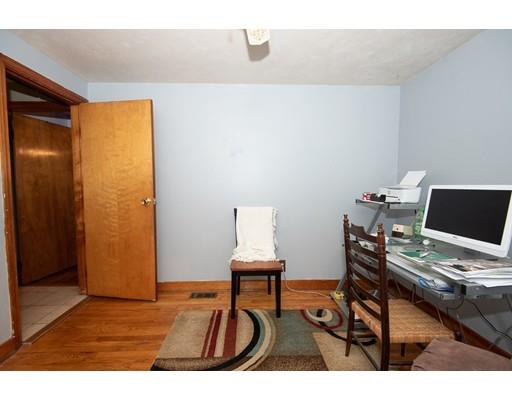 52 Hough Road Sutton, MA 01590 - Photo 12 of 23 a workspace with furniture and wooden floor