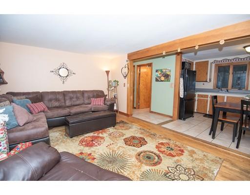 52 Hough Road Sutton, MA 01590 - Photo 8 of 23 a living room with furniture and a rug