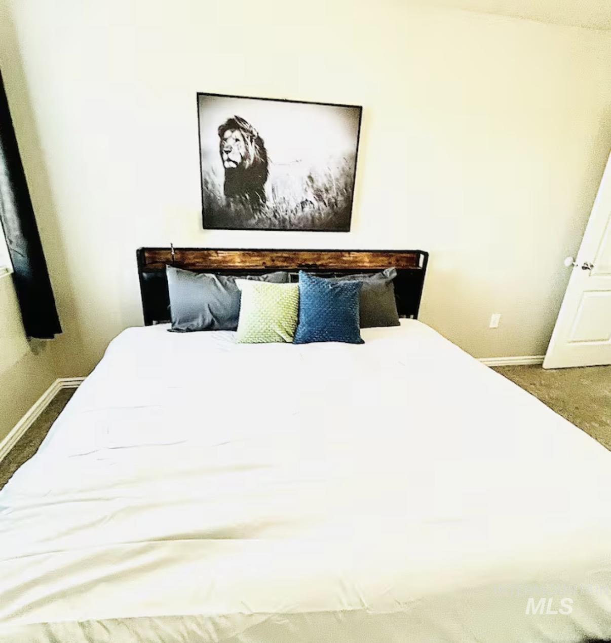 4802-4804 Maid Jessica Street Caldwell, ID 83607 - Photo 17 of 31 Bedroom featuring dark carpet and baseboards