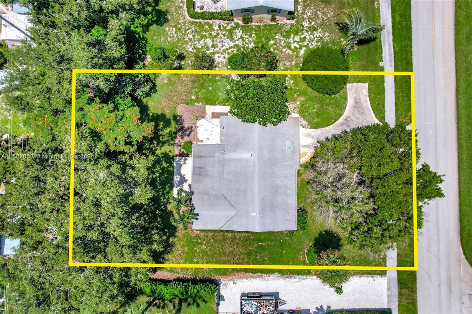 2598 Lone Pine Road Palm Beach Gardens, FL 33410 - Photo 8 of 29 an aerial view of a house with a garden