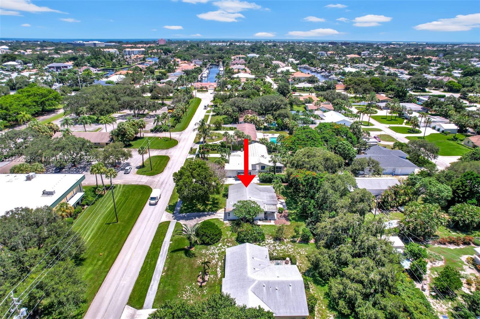 2598 Lone Pine Road Palm Beach Gardens, FL 33410 - Photo 9 of 29 an aerial view of residential houses with outdoor space and trees