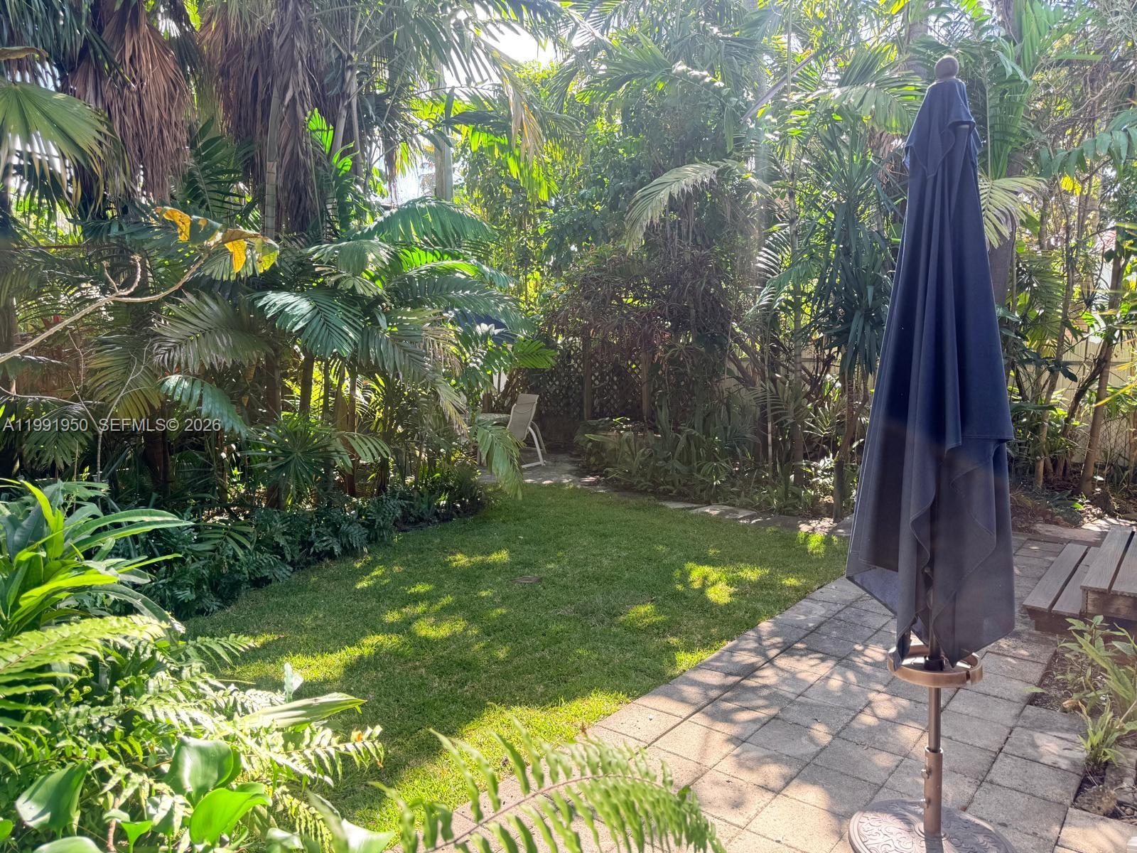720 Northeast 75th Street Miami, FL 33138 - Photo 27 of 36 a view of a back yard