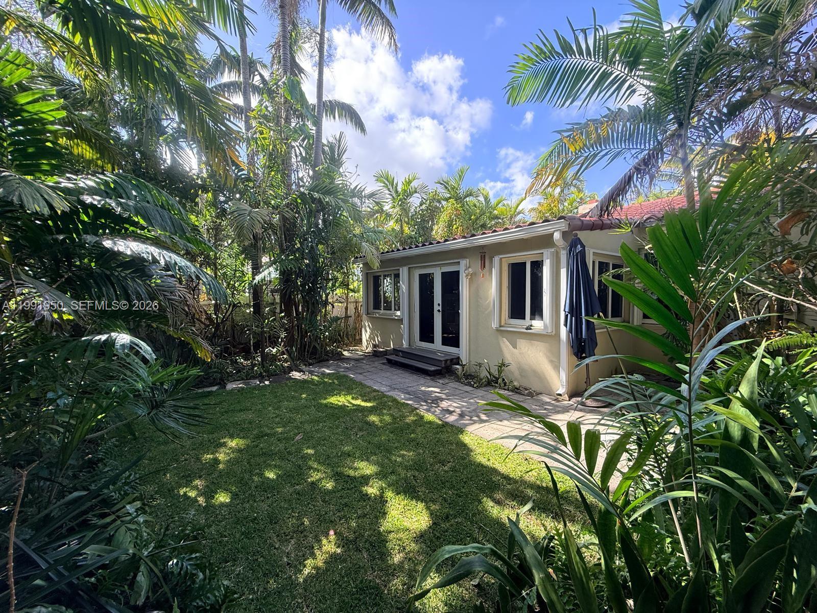 720 Northeast 75th Street Miami, FL 33138 - Photo 29 of 36 a view of a yard in front of house
