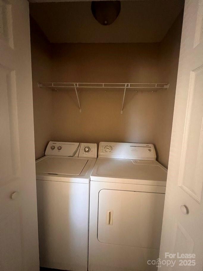 144 Mountain View Road, Unit B Bessemer City, NC 28016 - Photo 17 of 25 a utility room with dryer and washer