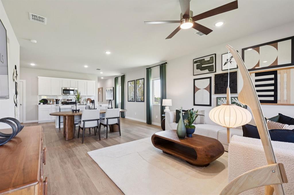 8204 Coastal Lane Pilot Point, TX 76258 - Photo 13 of 32 First Floor in the Magnolia home plan by Trophy Signature Homes – REPRESENTATIVE PHOTO