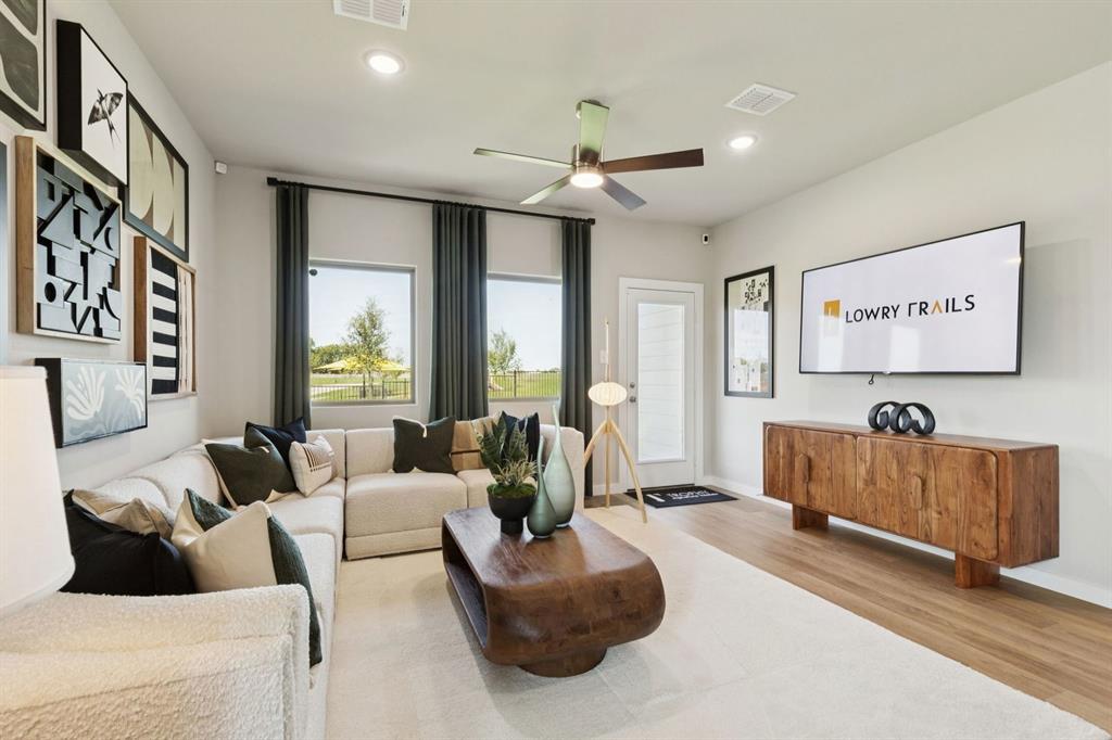 8204 Coastal Lane Pilot Point, TX 76258 - Photo 10 of 32 Living Room in the Magnolia home plan by Trophy Signature Homes – REPRESENTATIVE PHOTO