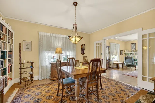 a kitchen with stainless steel appliances granite countertop a refrigerator a stove and a sink