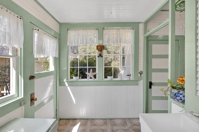 a bedroom with furniture and a book shelf