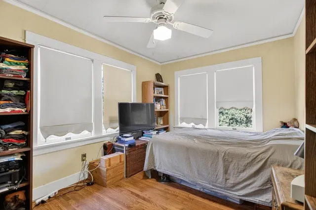 a view of a backyard with table and chairs