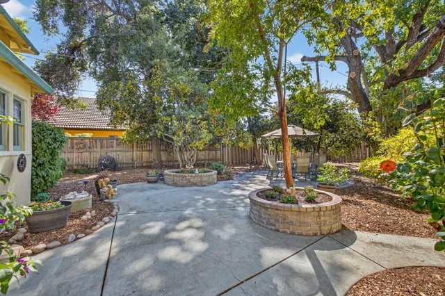 a view of swimming pool with a yard